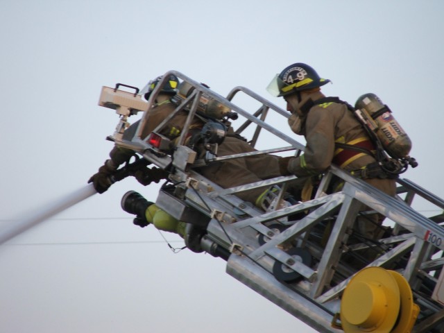 Station 4-9 firefighters on Truck 4-2 competing at the Zone 4 Firemen's Competition in Bird-In-Hand... May 2005